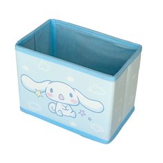 a toy storage box with an animal design on the front and sides, in blue