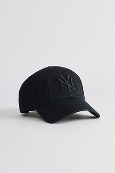 Cotton baseball cap by '47 Brand. Structured 6-panel fabrication and topped with a New York Yankees logo to the front. Includes an adjustable closure at the back and finished with a curved brim. Features '47 Brand New York Yankees MLB classic clean up hat Paneled cotton cap New York Yankees logo embroidery Adjustable strap closure Content + Care 100% Cotton Spot clean Imported Size + Fit Adjustable circumference | '47 Brand MLB New York Yankees Classic Clean Up Hat in Pitch black at Urban Outfit Classic Baseball Cap For Streetwear During Baseball Season, Classic Trucker Hat For Baseball Season With Curved Visor, Classic Trucker Hat For Baseball Season, Classic Baseball Cap With Curved Visor For Sports Events, Classic Baseball Cap For Sports Events, Classic Baseball Cap With Curved Visor For Baseball Season, Baseball Season Logo Baseball Cap With Flat Bill, Classic Baseball Cap With Curved Visor, Classic Dad Hat For Sports Events