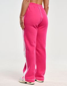 Loved by all for their cosiness and dependability. The Blur Flare Sweatpants are the perfect basics to help you get more out of your athleisure - Regular Waisted. Mid-rise waistband - Fabric is cotton mix for warmth and softness - Waist pockets - Embroidered ECHT Logo - Designed for low movement activities 60% Cotton, 40% Polyester Skye is wearing size Small. She is 170cm (5'6") tall with an 33" bust, a 25" waist and 36" hips. Sporty Pink Straight Leg Pants, Athleisure Straight Joggers With Ribbed Waistband, Pink Wide Leg Sweatpants Athleisure Style, Pink Wide Leg Athleisure Sweatpants, Sporty Solid Color Sweatpants, Sporty Sweatpants With Ribbed Waistband And Straight Leg, Sporty Straight Leg Sweatpants With Ribbed Waistband, Sporty Straight Joggers With Ribbed Waistband, Comfortable Sports Pants With Straight Leg