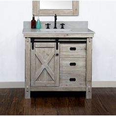 a bathroom vanity with a mirror above it