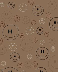 an image of many smiley faces on a brown background