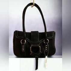 Vintage Black Leather Shoulder Bag With Gold Accents. The Dimensions Of This Item Are 10 Inches In Width And 5.5 Inches In Height, Not Including The Straps.It Is New With Tags And In Excellent Condition. Black Leather Satchel With Buckle Closure, Elegant Suede Shoulder Bag With Metal Hardware, Hardware Detailed Satchel Shoulder Bag, Everyday Black Satchel With Brass Hardware, Everyday Black Shoulder Bag With Brass Hardware, Black Leather Satchel With Brass Hardware, Black Shoulder Bag With Metal Hardware For Fall, Chic Black Satchel With Brass Hardware, Chic Black Bag With Hardware Details