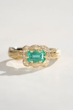 Logan Hollowell Exclusive Pinky Ring Luxury Yellow Gold Emerald Ring With Single Cut Diamonds, Luxury Gold Emerald Ring With Pave Setting, Luxury Green Diamond Ring Stamped 14k, Heirloom Tsavorite Emerald Ring In Gold, Yellow Gold Emerald Cluster Ring With Center Stone, Green 14k Gold Jewelry With Single Cut Diamonds, Yellow Gold Emerald-cut Ring With Single Cut Diamonds, Yellow Gold Tsavorite Ring With Halo Setting, Yellow Gold Rings With Tsavorite In Halo Setting