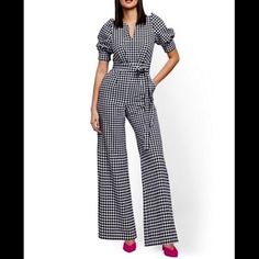 New York & Company Gingham Jumpsuit. Bell Bottoms, Puff Sleeves, Belted Waist, Back Zip. Side Slip Pockets, Pintuck Pleated Bust. Size Small. Measurements Laying Flat Are 19" From Pit To Pit, 15" Across The Waist, 18" Across The Hips, 13.5" Bottom Leg Opening And 59" From Shoulder To Bottom. I Am Wearing It And I Am 5'4" And It Is Slightly Long. New With Tags. Original Retail $89.95. Feels So Sexy On. Chic Summer Gingham Jumpsuit, Chic Summer Plaid Jumpsuits And Rompers, Chic Plaid Jumpsuit For Summer, Chic Plaid Jumpsuits And Rompers For Summer, Spring Fitted Gingham Jumpsuits And Rompers, Fitted Gingham Jumpsuits And Rompers For Spring, Casual Fitted Plaid Jumpsuits And Rompers, Gingham Jumpsuit, Pin Tucks