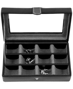 an open black leather case with six pairs of cufflinks