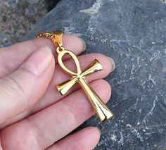 "This listing os for the Ankh cross necklace only. Please see below for the link to the Figaro chain shown layered on the model. ~18k gold plated Stainless steel Ankh Cross pendant - 45x25mm. ~18k gold plated Stainless steel chain. ~Water, Heat, Sweat resistant. ~No discolouration or tarnishing (no green skin). ~Hypoallergenic. ~Removable pendant, chain can be worn on its own. Please select chain length from the drop down menu. The length does not include the pendant. The model in is wearing a 24\" necklace. Your item will arrive in a drawstring pouch - Ready for Gift Giving! *The Figaro chain shown layered on the model is available here: https://www.etsy.com/ca/listing/1294313145/men-figaro-chain-necklace-18k-gold?click_key=b079e8520a0bab657fcc1f64fa216f5d317577b4%3A1294313145&click_sum=6 Gold Spiritual Cross Necklace In Stainless Steel, Gold Stainless Steel Spiritual Cross Necklace, Gold Stainless Steel Cross Necklace As Gift, Gold Stainless Steel Cross Necklace For Gift, Gold Ankh Cross Necklace Gift, Ankh Cross, Green Skin, Figaro Chain Necklace, Unisex Gift