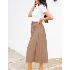 Khaki Elastic Waist Pleated Button Midi Skirt Casual Pleated Midi Bottoms, Casual Workwear Maxi Skirt With Button Closure, Casual Khaki Lined Skirt Bottoms, Casual Maxi Skirt With Button Closure For Work, Solid Skirt With Button Closure, Solid Color Skirt With Button Closure, Solid Color Long Skirt For Day Out, Khaki Midi Skirt For Spring, Long Skirt For Day Out In Solid Color