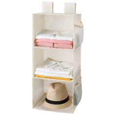 three tiered shelf with hats and clothing on it's sides, against a white background