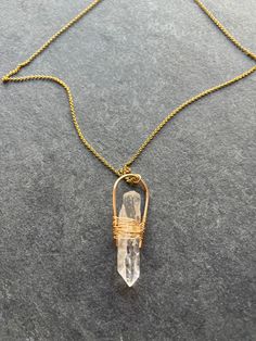 ✨a clear crystal quartz is elegantly wrapped with a minimalist design✨ Clear Quartz Pendant, Minimalist Quartz Jewelry For Healing, Handmade Clear Quartz Jewelry, Elegant Quartz Crystal Necklace For Healing, Elegant Quartz Crystal Necklaces With Gemstone, Elegant Wire Wrapped Mineral Crystal Jewelry, Elegant Quartz Crystal Necklace With Gemstone, Elegant Clear Necklace For Healing, Elegant Clear Quartz Crystal Necklace