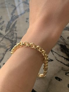 5.5 grams Bracelet lengt: 9 inches Bracelet width: 0.40 14K Gold Thick Chain Bracelet Let's Stay Connected FOLLOW ME ON INSTAGRAM FOR SPECIAL DEALS AND GIVEAWAYS Instagram Link : https://www.instagram.com/noiconejewellry/ ABOUT US I founded Noicone Jewellery, Istanbul based jewellery brand, in 2020. Why? Because, I wanted to make something unique, innovative, creative, permanent, and fascinating.  I tried to gather my ambitions, ideas, skills at the same place. I wanted to share my style, creativity, and vision with a big audience and I tried to make all of these in my brand. I have tried to bring together every product I sell in this brand with my hands and mind in a common way and present them all in a way that is unique and unique in the world. My only goal here is to make the people wh Minimalist Oval Bracelets For Everyday Wear, Minimalist Oval Jubilee Bracelet, Oval Bracelet With Adjustable Chain For Everyday, Oval Adjustable Chain Bracelet For Everyday, Minimalist Oval Chain Bracelet Gift, Minimalist Tarnish Resistant Oval Bracelets, Everyday Oval Gold Chain Bracelet, Minimalist Oval Cable Chain Bracelets, Minimalist Oval Bracelets With Cable Chain