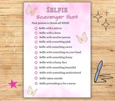 a selfie scavenger sheet with butterflies on it and a pen next to it