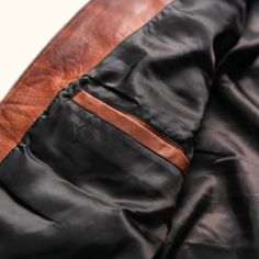 Embrace the spirit of adventure with the Teton Leather Jacket, a tribute to the rugged majesty of Wyoming’s Teton Mountain Range. Its rich, full-grain leather evokes the grandeur of these storied peaks, making a statement that is both daring and refined—striking the perfect balance between boldness and restraint. Crafted from premium full-grain sheep leather that develops a handsome patina with wear, the jacket features a modern brick-stitch pattern for a contemporary update. The lightweight dow Brown Leather Jacket For Outdoor Use, Classic Leather Outerwear For Outdoor, Classic Brown Biker Jacket For Outdoor, Outdoor Brown Leather Jacket, Fall Leather Jacket With Double-needle Sleeve For Outdoor, Cognac Leather Outerwear For Winter, Brown Winter Outerwear For Adventure, Leather Biker Jacket With Pockets For Outdoor, Rugged Winter Outerwear With Leather Lining