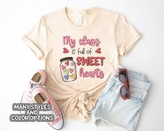 a t - shirt that says, my class is full of sweet hearts and two pairs of shoes