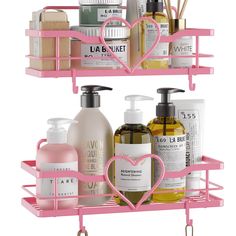 two pink shelves with soaps, lotions and other items