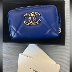 New Chanel Blue Zipped Coin Wallet With Gold Cc Logo, Dust Bag, Papers, And Box Included Chanel Blue, Coin Wallet, Cc Logo, Chanel Bag, Purse Wallet, Dust Bag, Card Holder, Coin, Bag Lady