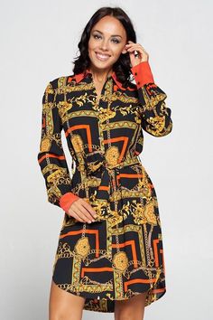 Classic statement print that adds edge to this simple shirt dress. Perfect for office to happy hour or dressed up for an event or evening out. Printed button-down dress with chain print in gold and red on black. 100% POLYESTER. Printed Shirt Dress For Workwear, Chic Printed Midi Length Shirt Dress, Elegant Long Sleeve Printed Shirt Dress, Elegant Printed Button-up Dress, Elegant Black Dress With Graphic Print, Chic Red Shirt Dress For Work, Trendy Black Shirt Dress For Party, Chic Spring Dress With Chain Print, Chic Chain Print Dress For Spring