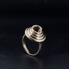 "Gold Wired Ring, Brass Spiral Ring, Loop Ring,  Hypnotic Ring, Snail Ring, Woman Ring,  Handmade Dainty Ring. ♥ DETAILS ♥ *Materials: Brass *Size: All sizes are available. ♥ DELIVERY ♥ *IMPORTANT: Before placing an order, please double check your delivery address is correct and complete to avoid delays and lost packages. *You can return your purchased item within 15 days after successful delivery. *We offer a 100% \"Money Back Guarantee\" if you are not satisfied with your purchase. MORE RINGS: https://www.etsy.com/in-en/shop/JewelryIndiaArt Thank you for visiting our shop! If you have any questions, please do not hesitate to send us a message.     JewelryIndiaArt" Adjustable Spiral Rings With A Modern Twist, Adjustable Spiral Ring With Modern Twist, Adjustable Spiral Ring With A Modern Twist, Adjustable Spiral Yellow Gold Ring, Unique Spiral Rings For Anniversary, Adjustable Spiral Promise Rings, Unique Spiral Promise Ring Jewelry, Unique Spiral Promise Ring, Gift Spiral Ring With A Modern Twist