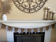 a decorated fireplace mantle with a clock above it