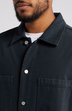 A pair of chest pockets furthers the utilitarian look of this all-cotton shirt finished with a straight hem. 26 1/2" length; 46" chest (size Medium) Front button closure Spread collar Long sleeves with button cuffs Chest patch pockets 100% cotton Machine wash, dry flat Imported Unstructured Cotton Shirt With Flap Pockets, Collared Utility Shirt With Pockets, Cotton Shirt With Flap Pockets For Workwear, Classic Shacket With Camp Collar And Pockets, Cotton Utility Shirt With Camp Collar, Utility Collared Shirt With Welt Pockets, Classic Cotton Shacket With Patch Pockets, Utility Collared Top With Buttons, Cotton Shacket With Lapel Collar And Welt Pockets