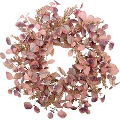 a wreath made out of dried flowers and leaves