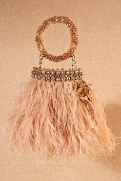 Beige, gold handcrafted ostrich feather bag, featuring jeweled elements on its bag opening and a jeweled bracelet handle. - Aza Fashions Rock Crystal Necklace, Bracelet Bag, French Knot Embroidery, Beige Handbags, Feather Bracelet, Tarun Tahiliani, Potli Bags, Crystal Bangle, Ostrich Feather