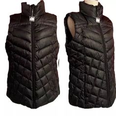 Big Chill Sleeveless Puffer Vest Full Zip Closure, With A Stand Up Collar, And Zip Closure Side Pockets. 100% Polyester Shell And Lining. Filling Is 85% Polyester, 8% Down And 7% Feather Size Medium New, With Tags Shown On A Size 4 Dress Form About 20" Across Bust, Measured At Under Arms [40" Total] 22" Across Bottom 25" Long, From Shoulder Down Excellent New Condition. Original Tags Attached. Fitted Vest Outerwear For Cold Weather, Sleeveless Puffer Vest For Cold Weather, Cold Weather Sleeveless Vest Outerwear, Black Winter Vest Outerwear, Cold Weather Sleeveless Nylon Vest, Sleeveless Nylon Vest For Cold Weather, Black Cold Weather Vest Outerwear, Black Vest Outerwear For Cold Weather, Fall Nylon Sleeveless Vest