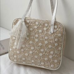 This Is A New Straw Bag With A White Floral Lace Overlay. Perfect For The Beach And Summer Weather! Casual White Square Crochet Bag, White Straw Bag For Spring Vacation, White Square Crochet Bag For Vacation, White Square Summer Beach Bag, Trendy White Crochet Bag For Daily Use, Summer White Square Beach Bag, Large Capacity White Shoulder Bag For Summer, White Straw Bag For Spring And Summer, Trendy White Rectangular Straw Bag