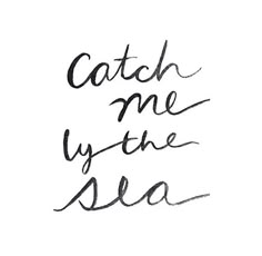 the words catch me by the sea written in black ink