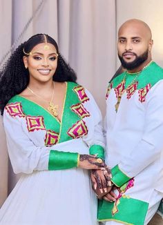 Step into a world of timeless elegance with this stunning Ethiopian traditional attire designed for couples. Crafted with meticulous attention to detail, this ensemble captures the essence of Ethiopian culture and celebrates the beauty of togetherness. For the gentlemen, a regal ensemble awaits. The outfit features a tailored shirt, known as a "Kemis," adorned with intricate embroidery along the neckline and cuffs. The rich colors of the fabric, often made from the finest Ethiopian cotton, radia Habesha Wedding Dress, Habesha Wedding, Ethiopian Culture, Habesha Kemis, The Gentlemen, Cultural Celebration, Religious Books, Traditional Attire, Intricate Embroidery