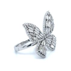 Metal: 14K White Gold Stone: 141 Round and Baguette Diamonds Diamond Total Weight: 3.01CT Gold Weight: 5.85g Clarity: VVS1 and I1 Color: H-I Luxury White Gold Butterfly Ring With Cubic Zirconia, Luxury White Gold Butterfly Ring, Luxury Butterfly Ring For Wedding, Luxury White Butterfly Ring For Formal Occasions, Luxury White Butterfly Ring For Formal Events, Elegant Cubic Zirconia Butterfly Ring, Formal Butterfly-shaped Cubic Zirconia Rings, Luxury Diamond Butterfly Ring, Luxury Butterfly Ring For Anniversary