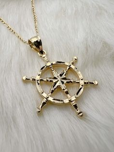 14k Solid Gold Wheel of Dharma Necklace, Gold Dharmachakra Pendant!  1 3D Captain's Wheel Charm, Buddhism Pendant, with Gift Box Solid 14k gold, 3D Ship Sail Wheel Pendant. Choose To Buy With 16in Chain Or Without Chain. Dimensions: 36.0mm x 23.4mm Diamond Cut finish for a radiant shine. Question? Please don't hesitate to contact me. *Wholesale or Custom* Wholesale: The more you buy, cheaper goes the price. Custom: Unique pieces to fit your very own style. (Different Color Gold) Contact Me for m Wheel Of Dharma, Gold Wheels, Schmuck Gold, Personalized Pendant, Jewelry Gold, Gold Style, Diamond Cut, Buddhism, X 23