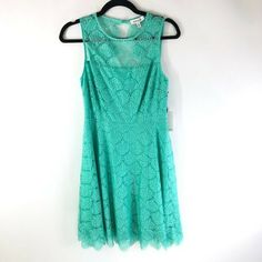 Kensie Dress A Line Sleeveless Lace Overlay Open Back Aqua Green Size 4 New With Tags! Comes From A Smoke Free Home. Feel Free To Ask Any Questions You May Have. Thanks For Looking! Stretch Sleeveless Lace Mini Dress, Casual Sleeveless Lace Dress, Green Sleeveless Lined Mini Dress, Baby Blue Dresses, Black Striped Dress, Dress Zipper, Lace Midi Dress, Knit Sweater Dress, Aqua Green