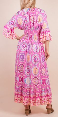 Ikat Print Maxi Dress with V-Neck and Ruched Waist. Features Ruffle Detail on 3/4 Length Sleeves and Bottom Hem. 100% Viscose Made in Italy One Size Fits Most Model is 5'7 Ikat Dress, Made Dress, Ikat Print, African Prints, Printed Maxi, Dress For Women, Printed Maxi Dress, Handbags On Sale, African Print