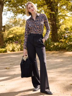 Prepare to live in the Newman this season, we made the perfect wide-leg trouser pant. With an extended tab waistband, flattering front pleat, and versatility that allows them to be dressed up with a suit jacket or worn casually with sneakers, this is 'the' pant. | J.McLaughlin Women's Newman Pants Black, Size 4 | Bainbridge/Nylon/Spandex Chic Business Casual Pantsuit For Fall, Chic Tailored Wide Leg Pants For Business Casual, High-waisted Wide Leg Pants With Welt Pockets For Fall, Formal Wide Leg Pants For Fall, Tailored Chic Wide Leg Pants For Fall, Chic Wide-leg Pantsuit For Office Wear, Formal Fall High-waisted Wide Leg Pants, Tailored Wide Leg Pants For Workwear In Fall, Tailored Wide-leg Dress Pants For Fall