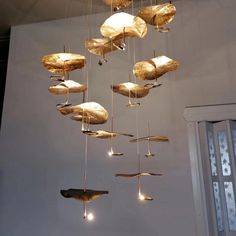 a chandelier hanging from the ceiling in a room