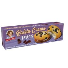 raisin creme pies with blueberries and almonds in a cardboard box