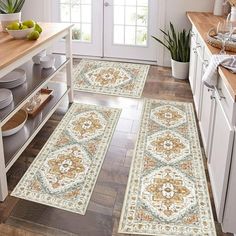 two rugs in the middle of a kitchen