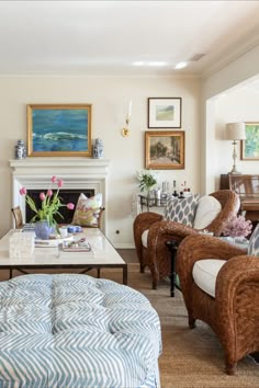 a living room filled with furniture and a fire place