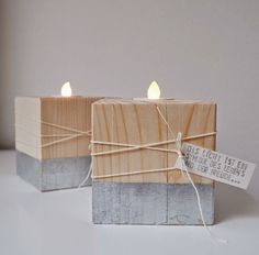 two wooden blocks tied with twine on top of each other