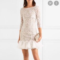 Stunning White Lace Dress With Back Lace Up Detail And 3/4 Length Sleeves. In Pristine Condition, Worn Literally One Time. No Flaws. Comes With Garment Bag. Fits Like A Size 4. This Dress Is Sold Out Everywhere! Fitted Lace Dress With Ruffles For Wedding Guests, Elegant Scalloped Lace Mini Dress, Elegant Mini Dress With Scalloped Lace, Elegant Lace Mini Dress For Weddings, Elegant Fitted Lace Mini Dress, Formal Feminine Mini Dress With Scalloped Lace, Feminine Formal Lace Mini Dress, Formal Feminine Mini Lace Dress, Feminine Formal Mini Lace Dress