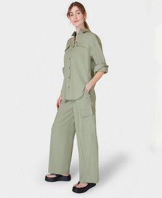 Our new utility-style everyday trousers. Made from a light and breathable linen blend with a touch of stretch. Relaxed, wide leg silhouette with shirred waistband. Two side slip pockets and two pockets on the leg. Pair with the matching shirt. Inseam length: 77cm / 30". Model wears size S and is 178cm/5'10" tall.. Style Code: SB9585Colour: Savannah Green Spring Utility Style Wide Leg Pants In Khaki, Spring Wide Leg Pants With Cargo Pockets For Work, Spring Workwear Wide Leg Pants With Cargo Pockets, Spring Utility Wide Leg Work Pants, Utility Wide Leg Pants For Spring, Spring Utility Wide Leg Pants For Workwear, Utility Style Khaki Wide Leg Workwear Pants, Spring Wide Leg Pants With Patch Pockets For Work, Utility Linen Cargo Pants With Relaxed Fit