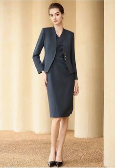 Look and feel your best in the office with this elegant business dress suit. Featuring a dress and blazer designed for business wear, this suit helps you make an impression and bolster your professional image—the perfect choice for the modern, working woman. Dress and Blazer V-Neck, Long sleeves blazer Side button dress; Sleeveless dress and knee-length Structured shoulders. POLYESTER 99% SPANDEX 1% LINING: POLYESTER 100% Imported Brand - AS/WQ® Model Number - 233025C1, 233025Q1 Womens Business Professional, Business Professional Dress, Working Dresses, Skirt Suits, Dark Blue Dress, Present Perfect, Business Dress, Business Wear, Professional Image