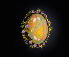 ♥ WILL BE MADE TO ORDER Statement Ethiopian opal ring with a mesmerizing color play and rainbow of colors within the stone. The true colors of opal shine best in an intense sun or fluorescent light; the more light goes in the stone, the more colors and patterns you will see. You won't be able to stop looking at it :) This mind-blowing piece of jewelry presents a huge oval shaped opal in rainbow colors and different patterns. The setting is nature inspired that fits perfectly with the stone. Tiny Jewelry Gift Basket, Women Nature, January Birthstone Jewelry, Turquoise Gold Ring, Ethiopian Opal Ring, Rainbow Opal, June Birthstone Jewelry, Color Play, Rainbow Moonstone Ring