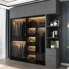 an open closet with clothes hanging on the walls and shelves next to it, in front of a large window