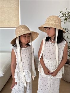 Get ready, the Ella Summer Girl Hat has arrived. Featuring with cotton neck tie and adjustable string inside the hat, this is the ultimate seaside accessory for your mini. Size: One Size 53cm Suitable for children aged 3+ years. Color: Off White Imported Summer Sun Hat With Uv Protection For Play, Summer Bucket Hat With Uv Protection For Play, Summer Uv Protection Bucket Hat For Play, Casual Summer Hats For Play, Summer Brimmed Bucket Hat For Play, Summer Play Brimmed Bucket Hat, Wide Brim Summer Bucket Hat For Play, Cute Summer Hats For Playtime, Summer Bucket Hat For Play