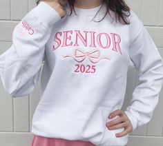 This cute and comfy sweatshirt is a great gift choice for any high school or college senior or grad. Available in various sizes, two styles (crewneck and hoodie) and multiple colors. Option to customize the sleeve with a name, school, initials, etc.  Perfect gift for birthday, holidays and graduation. Grad Gift, New Grad Gift, Graduation Sweatshirt, College Graduation, Graduation Gift, High School Graduation, Christmas gift for Grad, Senior Night "SENIOR" will be embroidered in the preppy arched High School Senior Christmas Gift Ideas, Senior Sweatshirts Ideas 2025, Senior Sweatshirts Ideas Diy Patches, White Letter Embroidery Sweatshirt For School, White School Spirit Sweatshirt For Campus, White School Spirit Sweatshirt With Letter Embroidery, White Custom Embroidery Sweatshirt For School Spirit, White Tops With Letter Embroidery For School, White Letter Embroidery Top For School