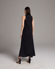 Make an effortless statement with our soft linen maxi dress. The lightweight linen blend makes this the perfect piece for a relaxed warm-weather look. Pair with the Linen Featherlight Blouse or Loose Knit Linen Sweater. 45% Rayon, 55% Linen Made in New York City Spring Workwear Maxi Dress With Side Slits, Summer Workwear Long Maxi Dress, Long Summer Maxi Dress For Work, Summer Workwear Maxi Dress, Chic Linen Maxi Dress For Daywear, Versatile Spring Maxi Dress, Sleek Maxi Dress For Spring, Chic Unlined Black Maxi Dress, Chic Black Unlined Maxi Dress