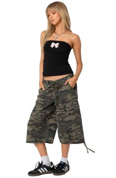 Channel laid-back skater style with these baggy cotton-twill Bermuda shorts in a camo pattern. Drawstrings cinch the waist and hems for next-level coolness. Zip fly with button closure Drawstring waist Front slant pockets; back flap-patch pocket; cargo flap-patch pocket Drawstring hems 100% cotton Machine wash, line dry Imported Cargo Bermuda Shorts, Camo Shorts, Swimwear Dress, Skater Style, Maternity Shops, Designer Clothes For Men, Toddler Girl Outfits, Women's Summer Fashion, Dress Romper