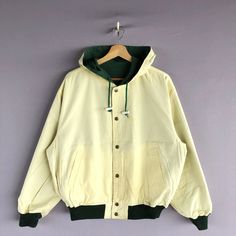 Vintage Pendre Reversible Hoodie Baseball Varsity Jacket | GF40041.  Manual Measurement (Laying Flat): 1) Chest: 26 Inch. 2) Length: 25 Inch. 3) Shoulder: 20.5 Inch. 4) Sleeve: 22.5 Inch. Please check measurements to insure a proper fit. Remember to allow yourself some extra room for movement. You can compare these with something from your closet that fits you well. Fabric Material: 100% Cotton. In good Condition overall. GF40041.  We do combine shipping. Please Read Before Purchase. Drop your p Green Fleece-lined Windbreaker For Streetwear, Yellow Spring Hoodie Outerwear, Vintage Hooded Hoodie For Spring, Spring Casual Windbreaker With Fleece Lining, Casual Spring Windbreaker With Fleece Lining, Retro Hooded Cotton Outerwear, Retro Hooded Windbreaker For Fall, Cotton Windbreaker With Fleece Lining For Streetwear, Cotton Hooded Windbreaker With Drawstring