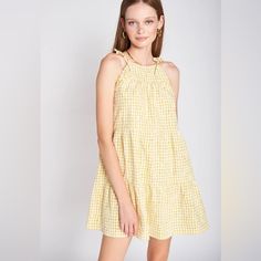 Super Cute New Without Tags En Saison Kanika Mini Babydoll Tiered Dress Size Small. Tie Up Straps, Pull Over Body Silhouette Gingham Dress With White Flower Embroidery All Over . So Cute & Summery- Tried On & Took Off Tags But Never Wore Out Boxmay24 Gingham Cotton Mini Dress For Beach, Gingham Cotton Mini Dress For The Beach, Yellow Sleeveless Mini Dress For Picnic, Yellow Sleeveless Mini Dress For Picnics, Yellow Tiered Summer Mini Dress, Yellow Tiered Mini Dress For Brunch, Cotton Gingham Mini Dress With Ruffles, Gingham Mini Dress With Ruffles In Cotton, Yellow Mini Dress For Picnic